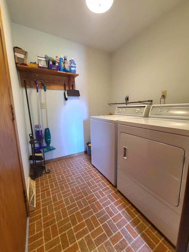 laundry area featuring independent washer and dryer