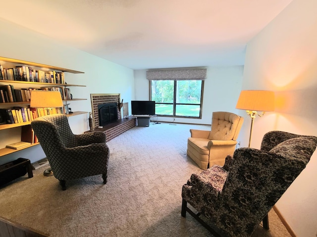 carpeted living room featuring a brick fireplace