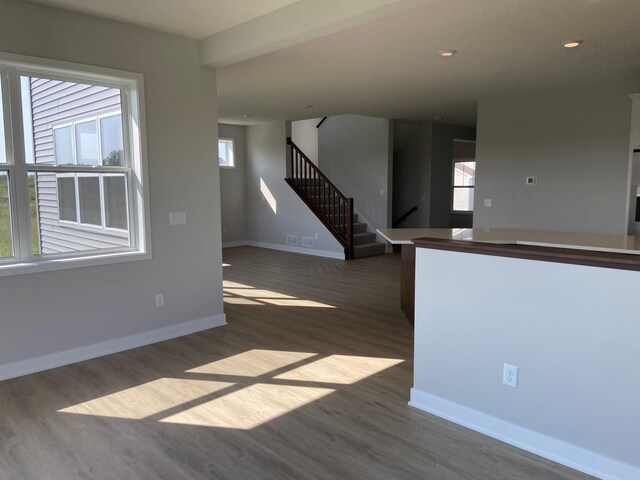 empty room featuring hardwood / wood-style flooring