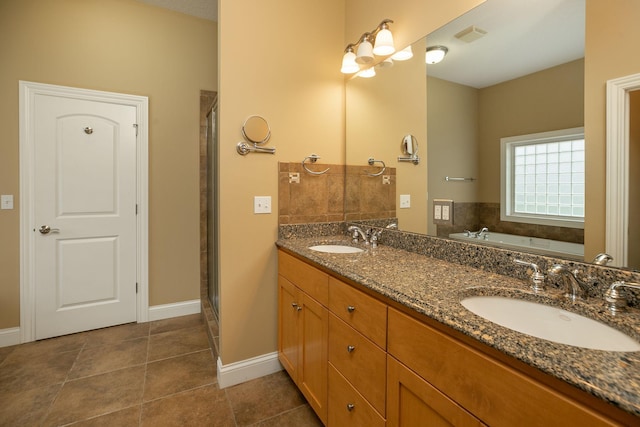 bathroom with vanity, separate shower and tub, and tile patterned floors