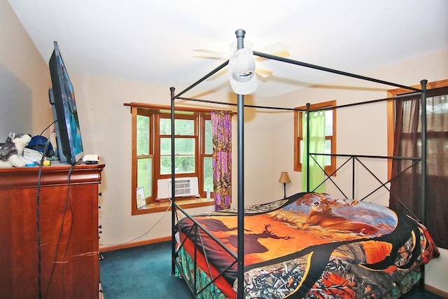 bedroom featuring cooling unit, ceiling fan, and carpet flooring