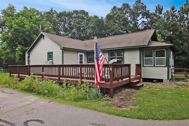 view of front of property featuring a deck