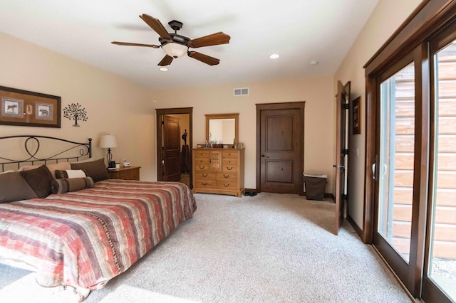 bedroom with ceiling fan, access to exterior, and light carpet