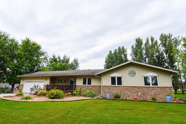 ranch-style house with a garage and a front lawn