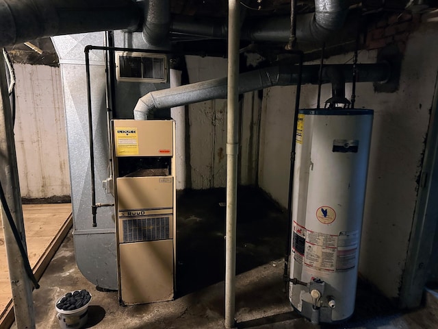 utility room with gas water heater