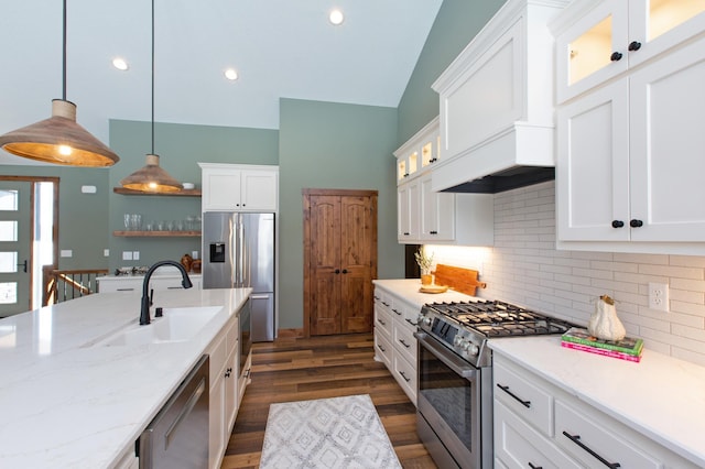 kitchen featuring white cabinetry, sink, and stainless steel appliances