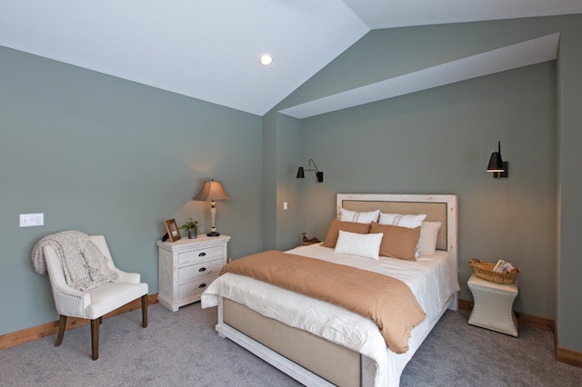 bedroom featuring carpet flooring and lofted ceiling