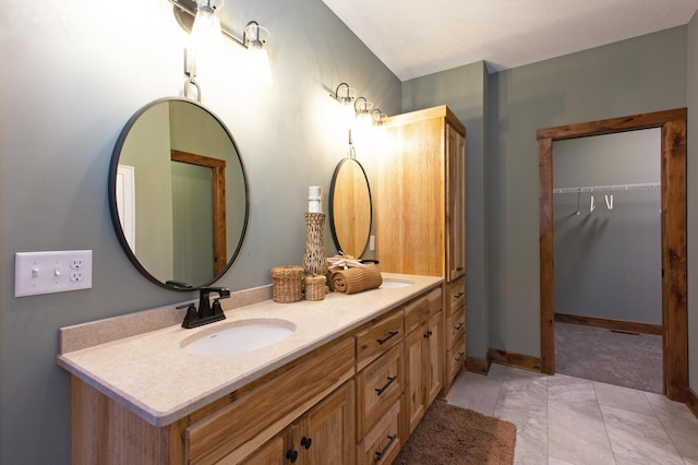 bathroom featuring tile patterned floors and vanity