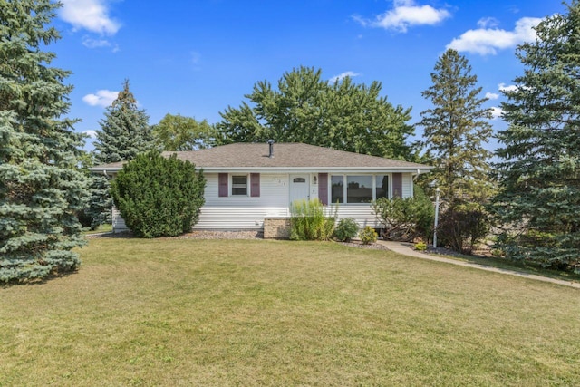 ranch-style home featuring a front yard