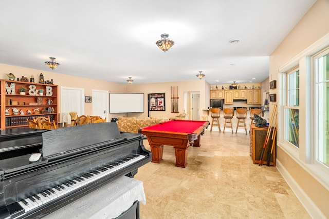 playroom with billiards and baseboards