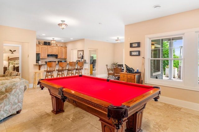 game room with recessed lighting and baseboards