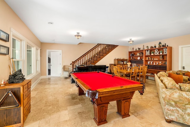 game room featuring pool table and baseboards