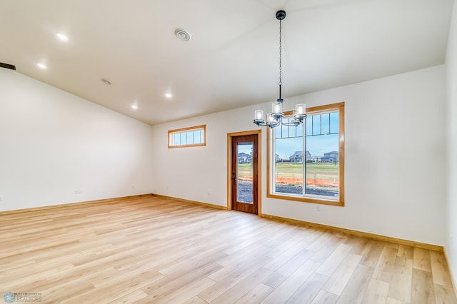 215 Emma Ct, Mapleton, ND 58059 - unfurnished room featuring a chandelier, baseboards, light wood-style flooring, vaulted ceiling, and recessed lighting