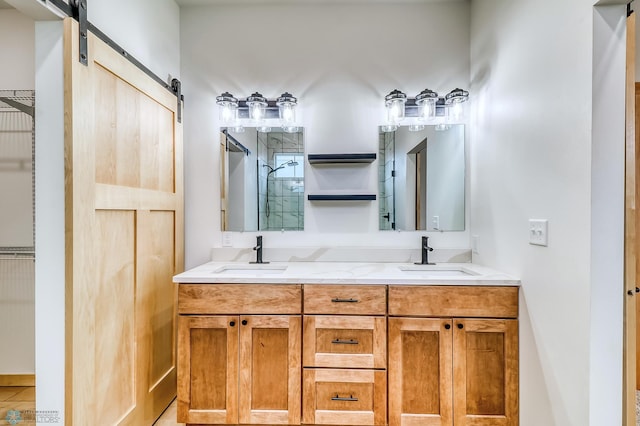 bathroom featuring tile patterned floors, vanity, and walk in shower