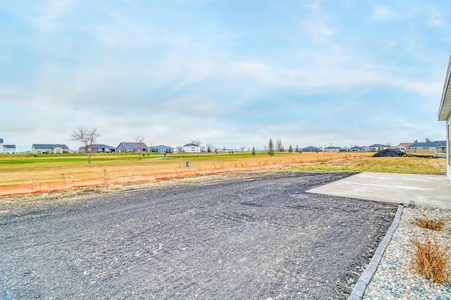 215 Emma Ct, Mapleton, ND 58059 - view of yard featuring a residential view and a patio