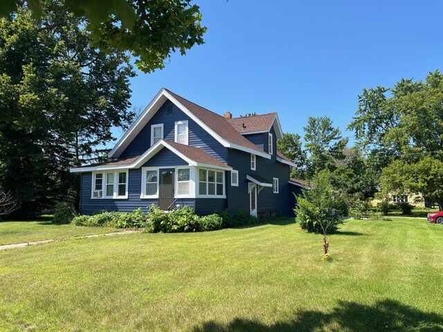 view of front of house with a front yard