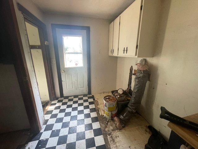 laundry area featuring tile patterned floors