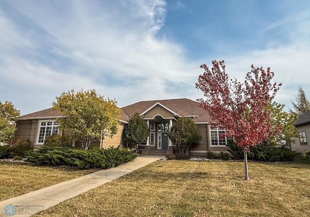 view of front facade with a front lawn