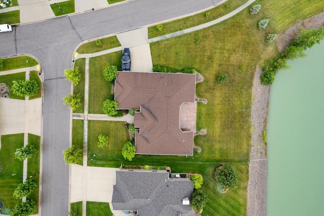 drone / aerial view featuring a water view