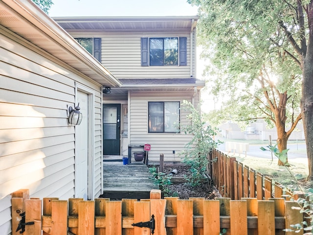 property entrance with fence