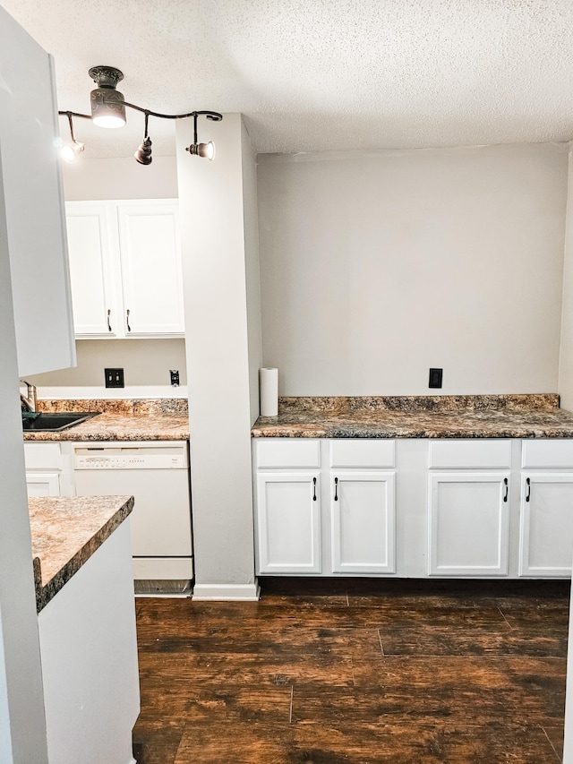 kitchen featuring dishwasher, a textured ceiling, white cabinets, and dark hardwood / wood-style floors