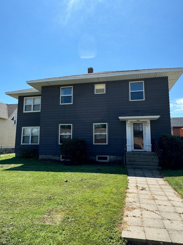 view of front of house with a front yard