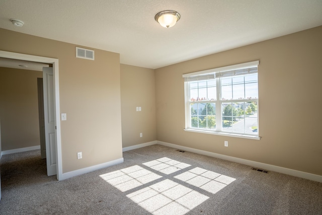 empty room with light carpet