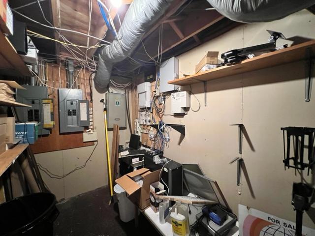 basement with electric panel