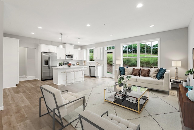 living room featuring light wood-type flooring