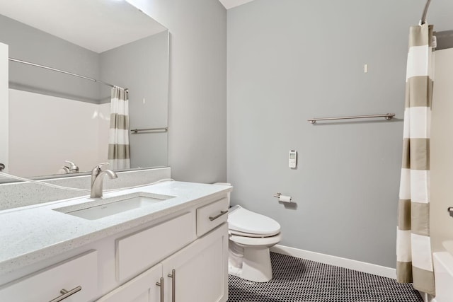 full bathroom with tile patterned floors, shower / bath combo, toilet, and vanity