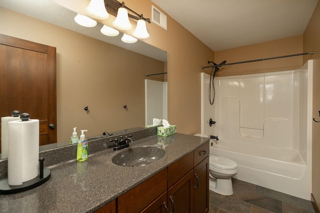 full bathroom with tub / shower combination, vanity, a textured ceiling, tile patterned flooring, and toilet