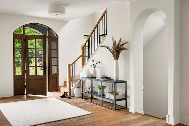 entryway with light hardwood / wood-style floors