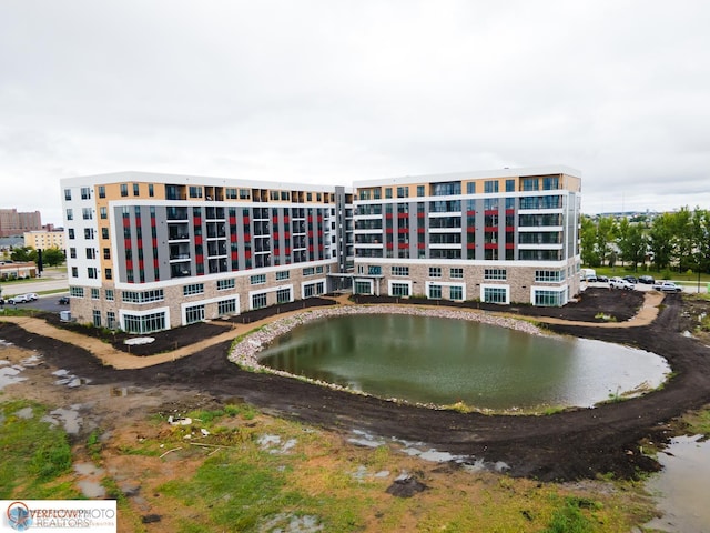 view of building exterior featuring a water view