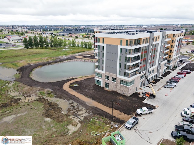 birds eye view of property featuring a water view