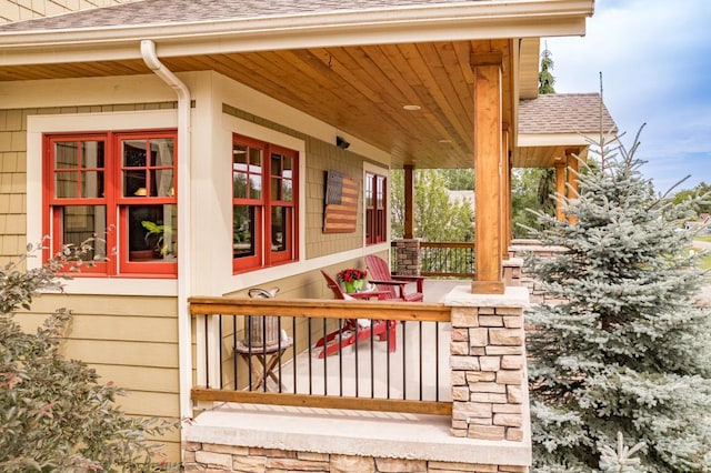 wooden deck with a porch