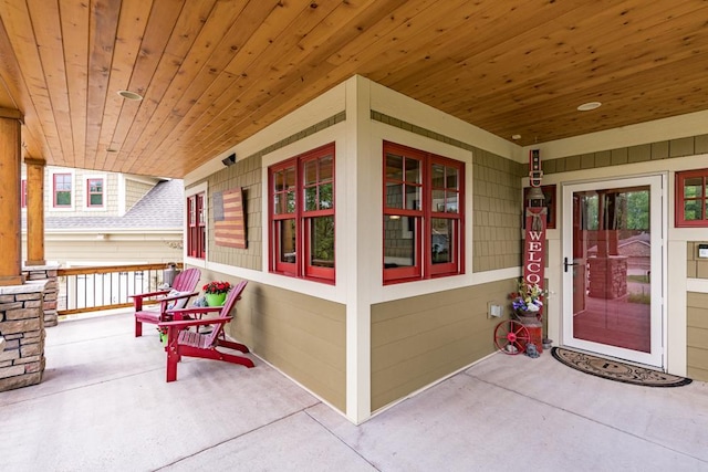 doorway to property with covered porch
