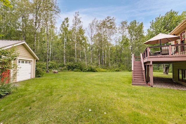 view of yard featuring a wooden deck and stairway