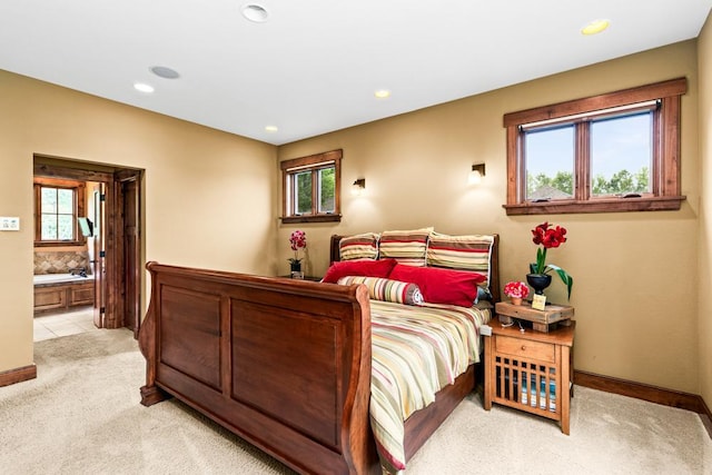 bedroom featuring recessed lighting, baseboards, and light carpet