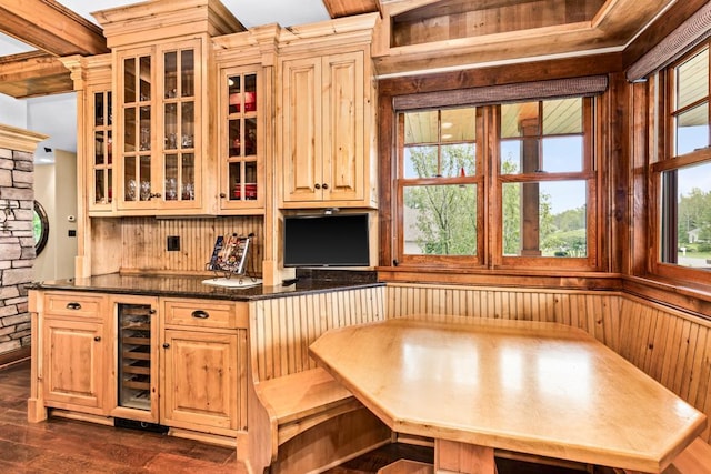5325 Roosevelt Dr, Hermantown, MN 55811 - kitchen with dark countertops, beverage cooler, plenty of natural light, and dark wood-style flooring