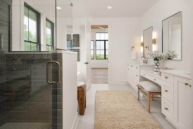 bathroom featuring vanity, hardwood / wood-style flooring, and an enclosed shower