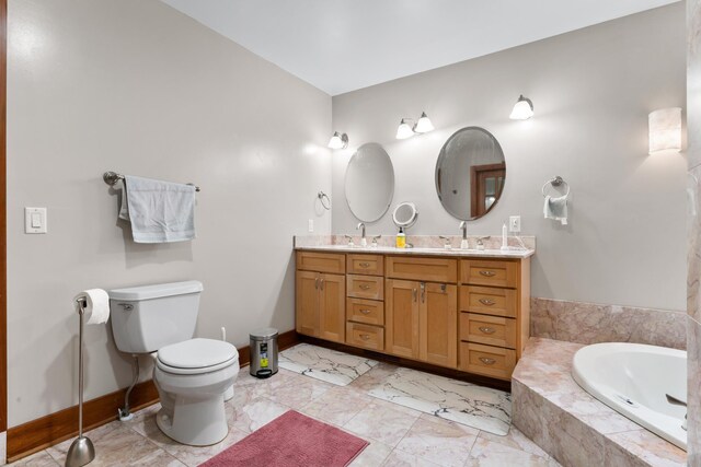 bathroom with toilet, a relaxing tiled tub, and vanity