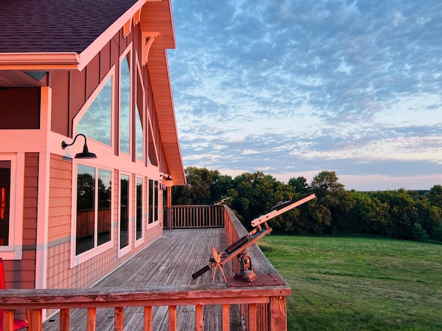 wooden deck with a yard