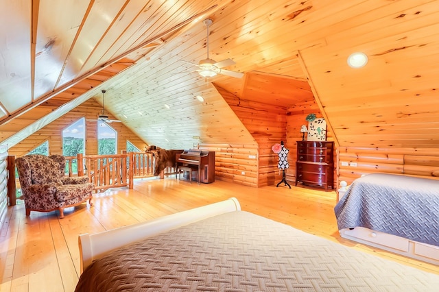 bedroom featuring rustic walls, lofted ceiling, hardwood / wood-style flooring, and wood ceiling