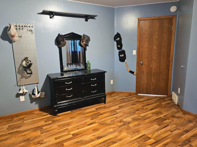 bedroom featuring light wood-type flooring