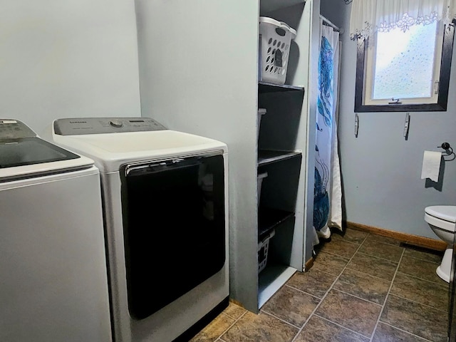 laundry area with separate washer and dryer