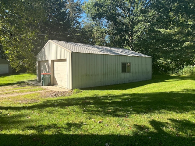 exterior space with a yard and wooden walls