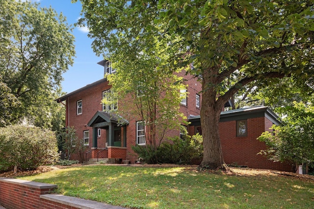 exterior space featuring a lawn