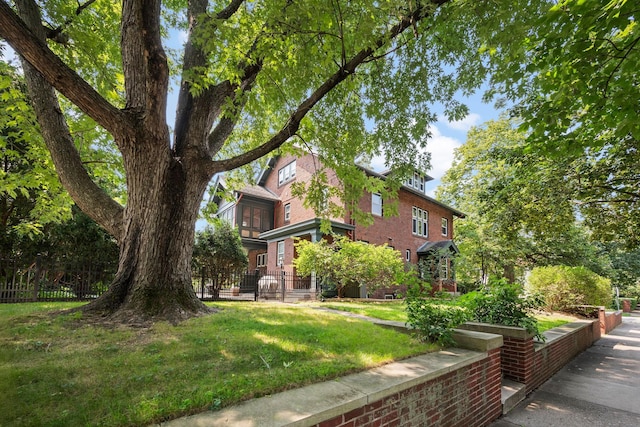 exterior space featuring a front lawn