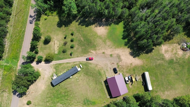 birds eye view of property with a rural view