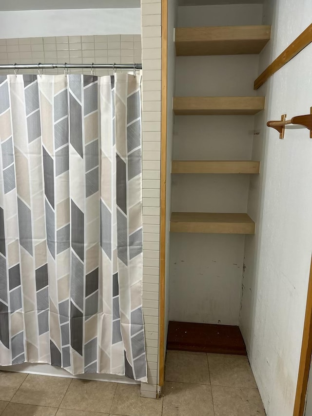 bathroom featuring tile patterned flooring